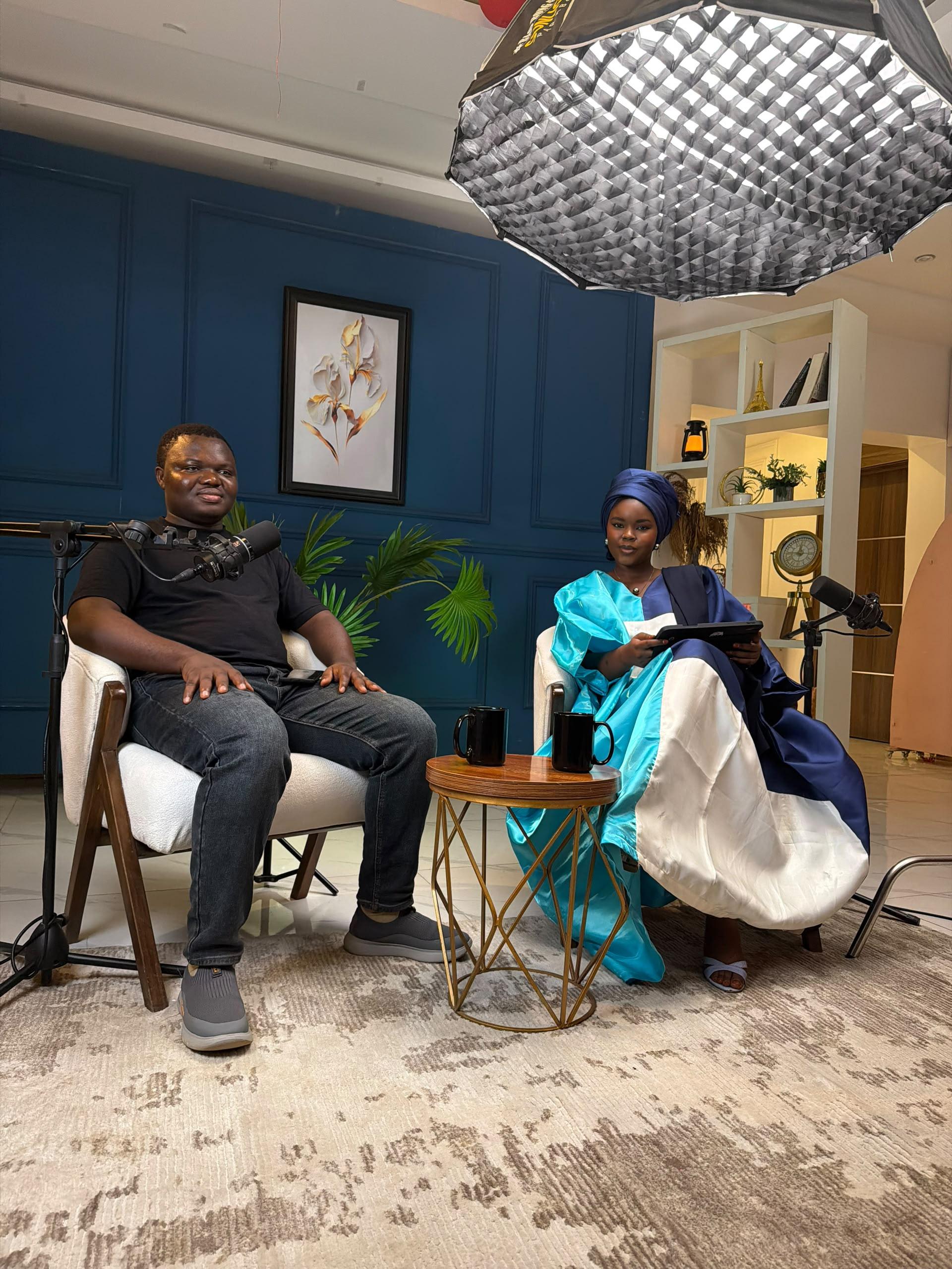 Halima interviewing a guest on set