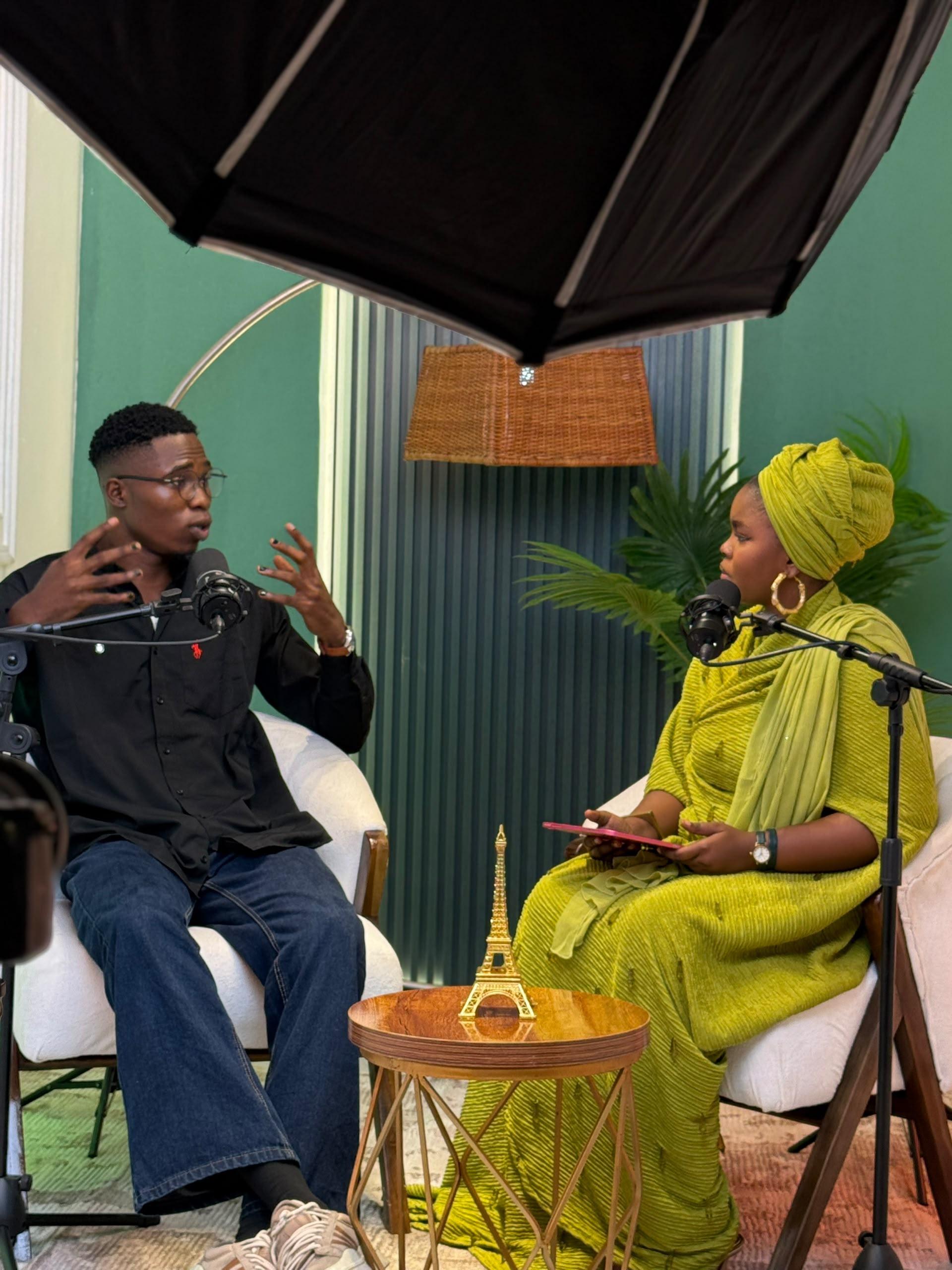 Halima in conversation with a guest